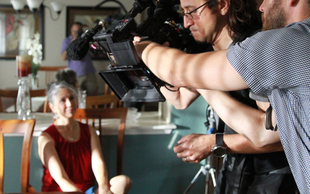 Esther waiting on camera crew